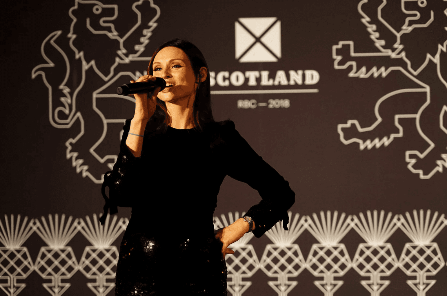 Lady on Mic in Scotland'